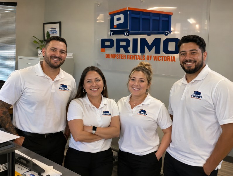 Four Primo Dumpster Rentals of Victoria staff in branded white polo shirts at the front desk